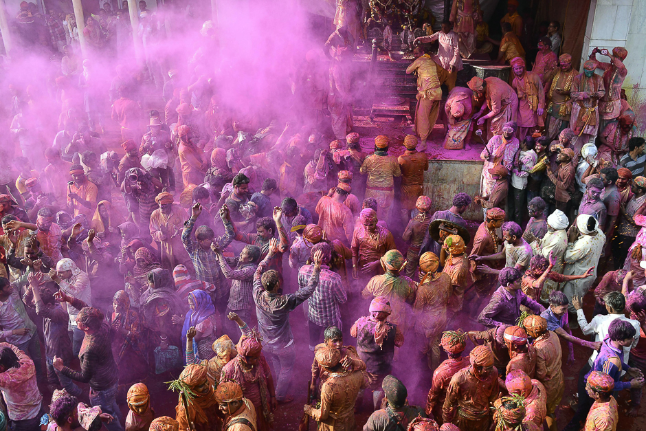 Indian Hindu devotees celebrate Holi, the spring festival of colours, during a traditional gathering at Nandgaon village in Uttar Pradesh state. PHOTO: AFP