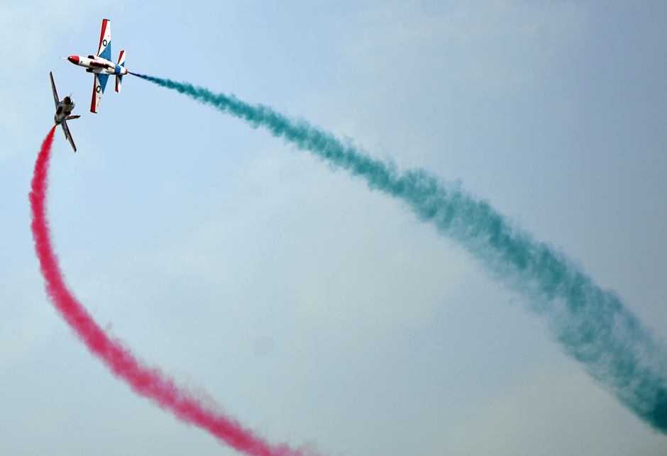 Jets perform aerobatic manouvers during a Pakistan Day military parade in Islamabad. PHOTO: AFP