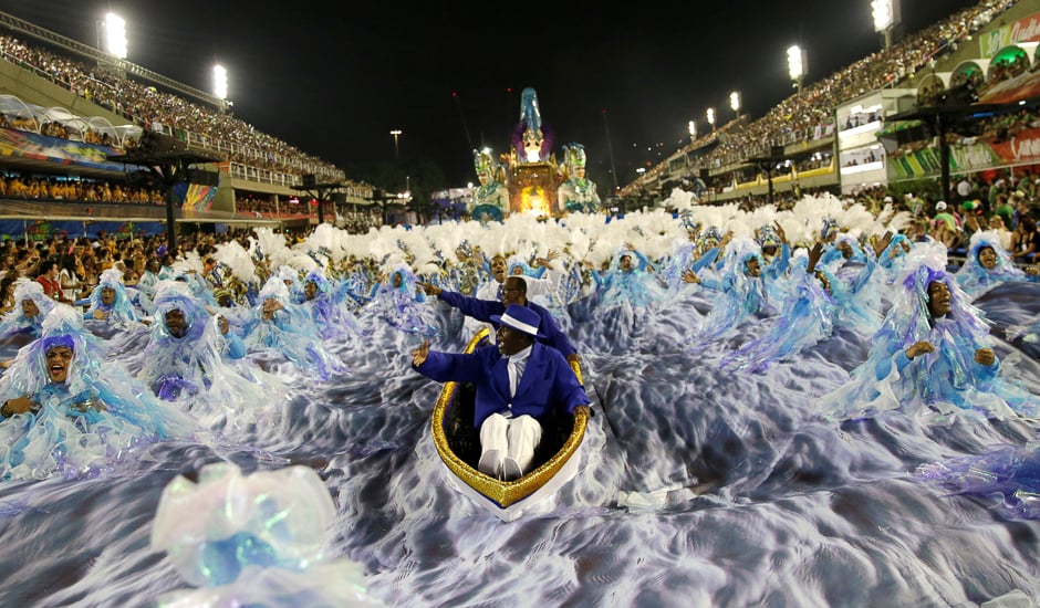 Revellers from Portela samba school perform during the second night of the carnival parade at the Sambadrome in Rio de Janeiro, Brazil. PHOTO: REUTERS