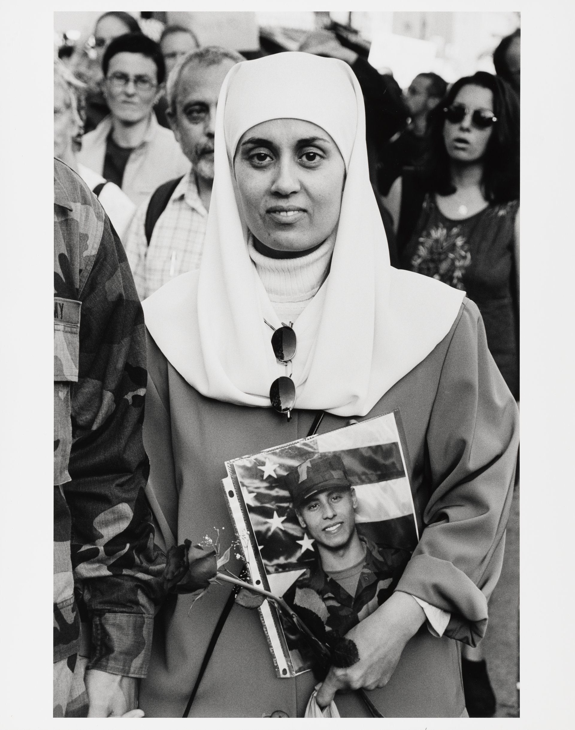 Debbie Almontaser with photograph of her son Yousif, 2001. PHOTO: MEL ROSENTHAL 