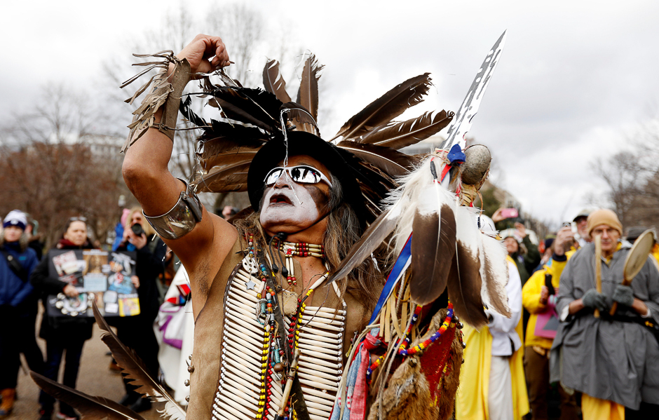 Little Thunder, a traditional dancer and indigenous activist from the Lakota tribe, dances as he demonstrates in front of the White House during a protest march and rally in opposition to the Dakota Access and Keystone XL pipelines in Washington, US. PHOTO: REUTERS