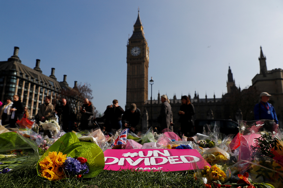 Floral tributes lie in Parliament Square following the attack in Westminster, central London, Britain. PHOTO: REUTERS