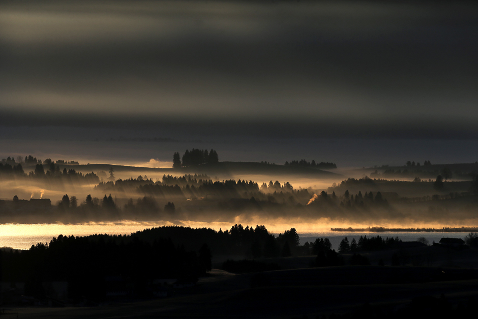The sunrise in early-morning haze is pictured in the region of Koenigswinkel, southern Germany. PHOTO: AFP