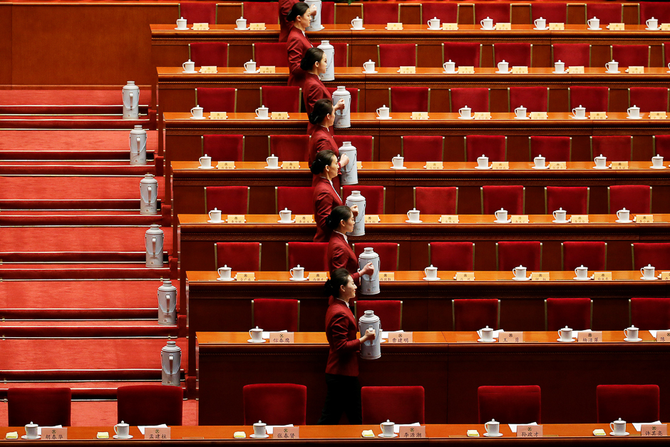 Attendants prepare tea before the opening session of the Chinese People's Political Consultative Conference (CPPCC) at the Great Hall of the People in Beijing, China. PHOTO: REUTERS