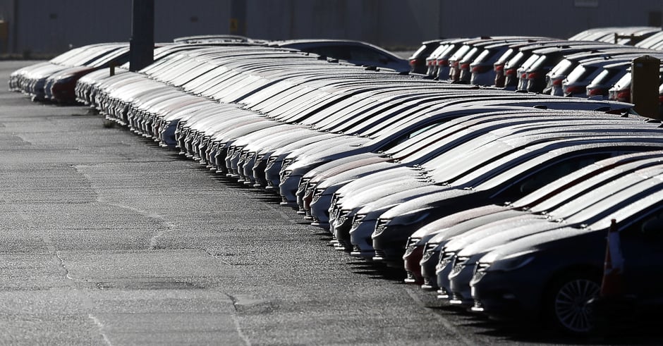 Vauxhall cars are lined up in preparation for delivery outside Vauxhall's plant in Ellesmere Port, Britain. PHOTO: REUTERS