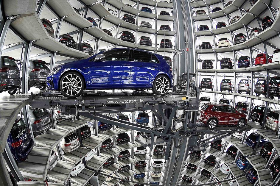 VW Golfs are loaded in a delivery tower at the plant of German carmaker Volkswagen in Wolfsburg, Germany. PHOTO: REUTERS