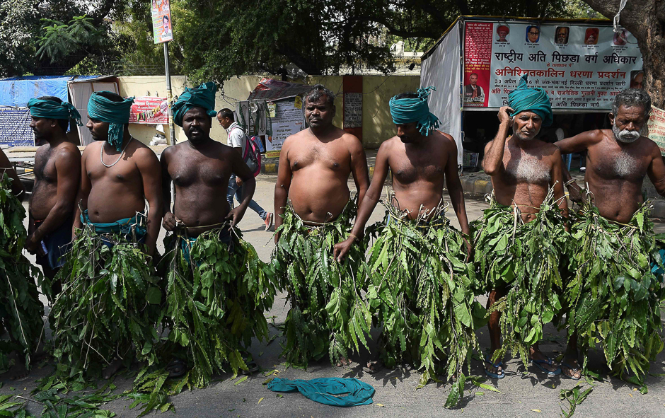 Indian farmers from the southern state of Tamil Nadu wear tree leaves as they take part in a protest in New Delhi. PHOTO: AFP