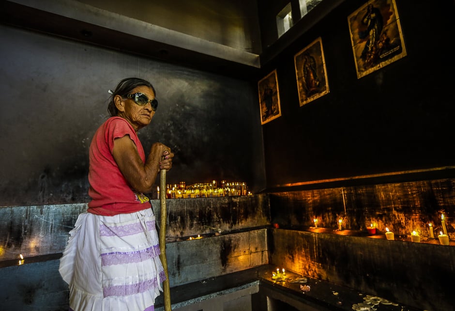 A blind woman participates in the celebration of Ash Wednesday at the cathedral in Managua. Ash Wednesday initiates Lent, that culminates in the Holy Week. PHOTO: AFP