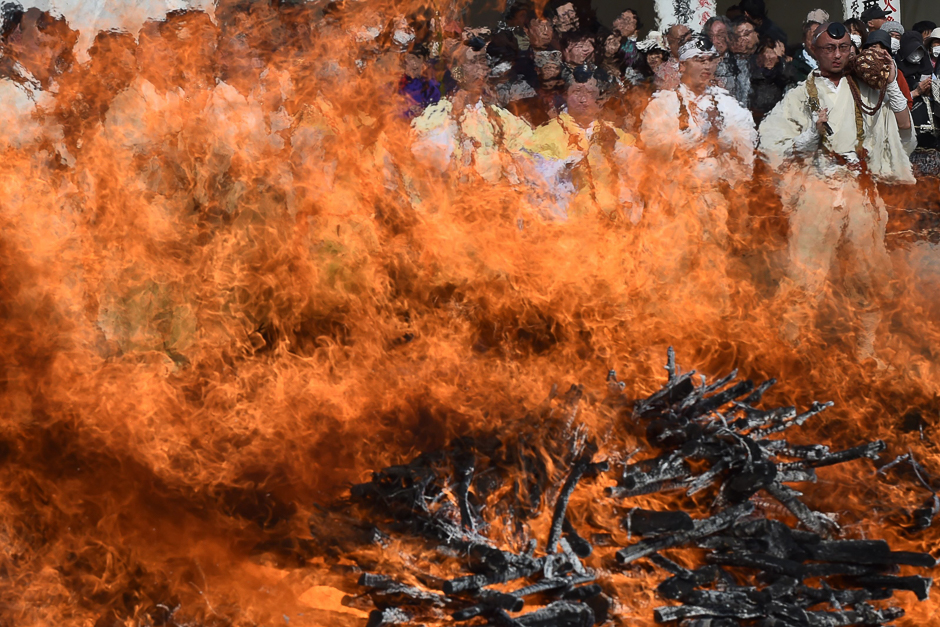 Buddhist monks pray in front of a big fire during the Nagatoro Hi-Matsuri or fire-walking festival, to herald the coming of spring, at the Fudoji temple in Nagatoro town, Saitama prefecture. PHOTO: AFP