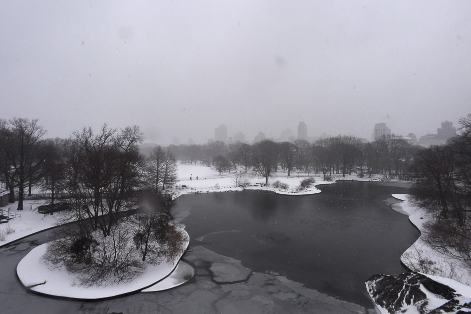 The New York skyline is seen across a frozen pond in Central Park. PHOTO: AFP