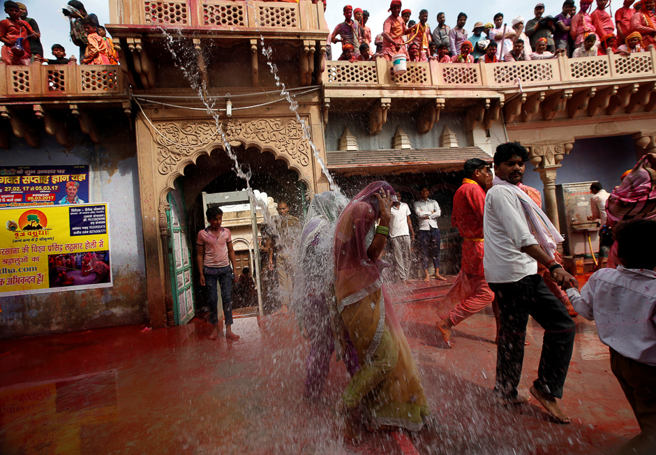Hindu devotees take part in the religious festival of Holi in Nandgaon village, in the state of Uttar Pradesh, India. PHOTO: REUTERS