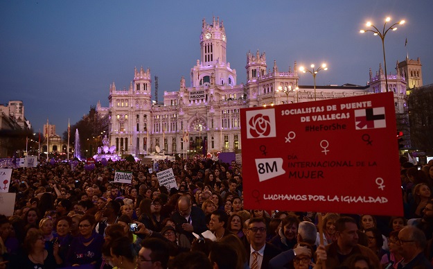 People take part in a rally during the International Women's Day on March 8, 2017 in Madrid. PHOTO: AFP