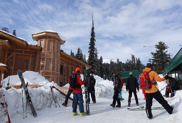 In this photograph taken on February 23, 2017, skiers wait to embark on the gondola at Gulmarg in Indian Occupied Kashmir. PHOTO: AFP