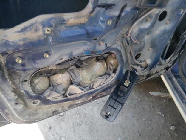 Image showing explosives packed in the door of the pickup recovered in the Chaman IBO. PHOTO: ISPR