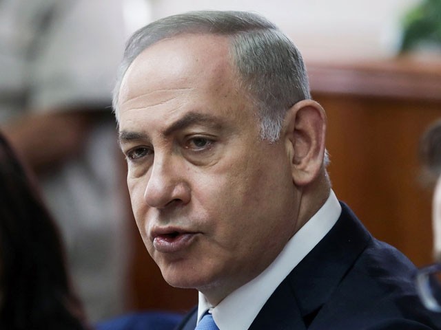 Israeli Prime Minister Benjamin Netanyahu (C) attends the weekly cabinet meeting at his office in Jerusalem on April 23, 2017. PHOTO: AFP