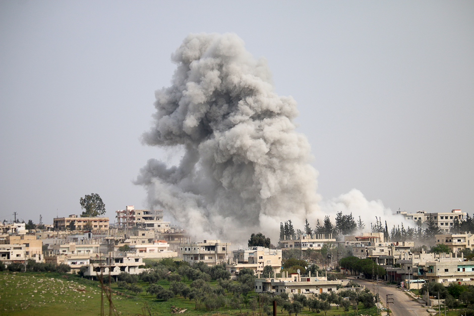 Smoke billows following a reported air strike on a rebel-held area in the southern Syrian city of Daraa. PHOTO: AFP