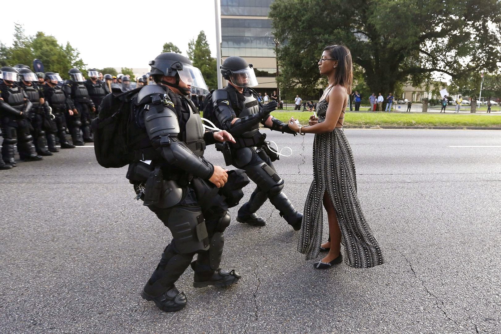 Leshia Evans and riot police during a protest against police brutality at the Baton Rouge police department in Louisiana. PHOTO: AFP