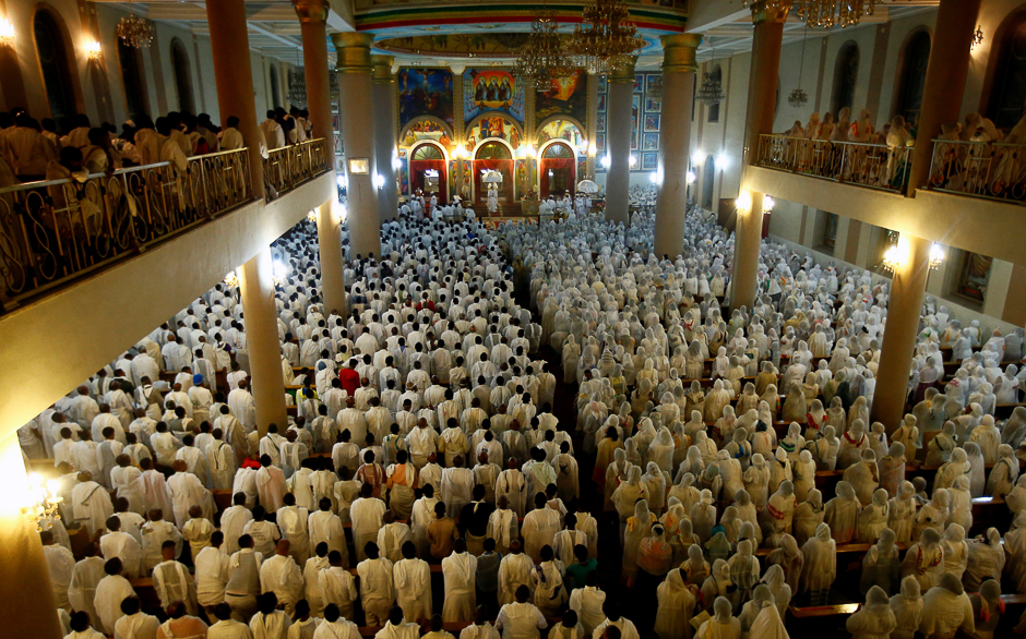 Ethiopian Orthodox faithful attend the easter eve prayers at the Medhane Alem church in Addis Ababa, Ethiopia. PHOTO: REUTERS