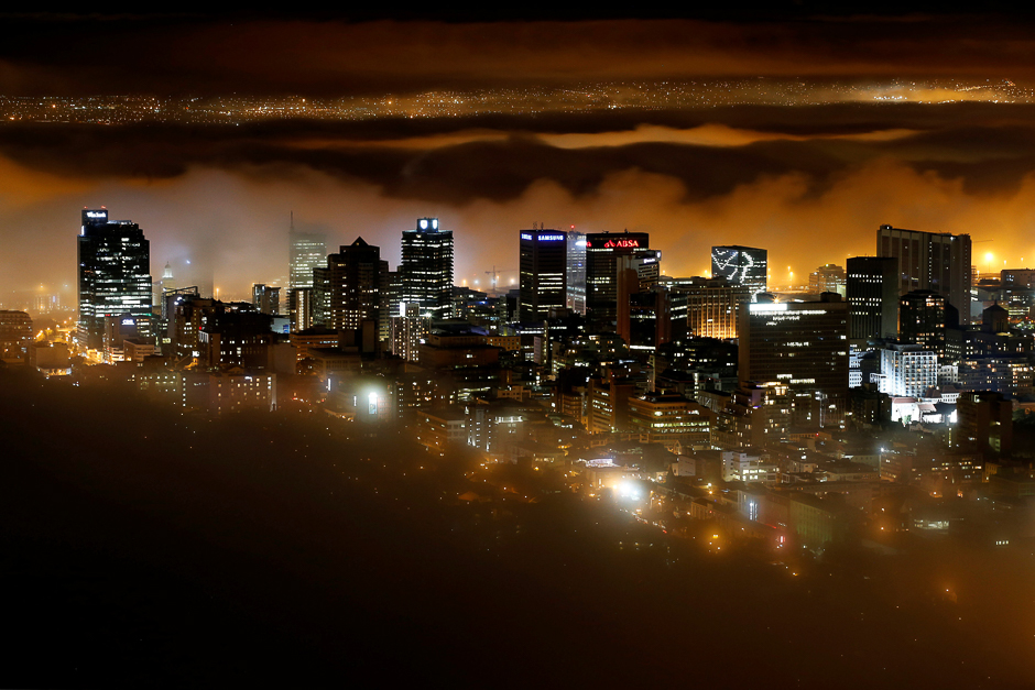 Seasonal fog enshrouds buildings in the city centre of Cape Town, South Africa. PHOTO: REUTERS