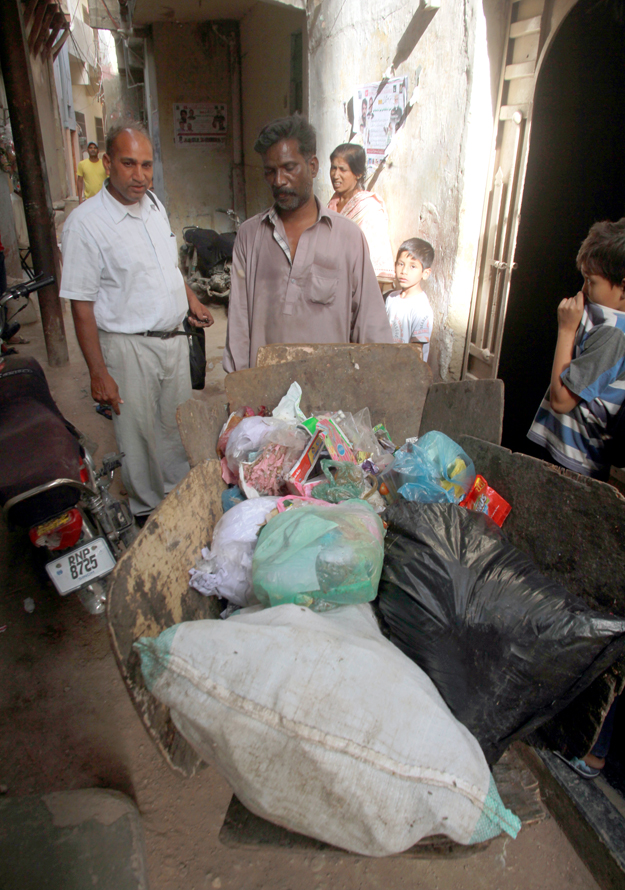The pastor, a former sailor in the Pakistan Navy, believes disease spreads due to poor hygiene. PHOTO: ATHAR KHAN/EXPRESS
