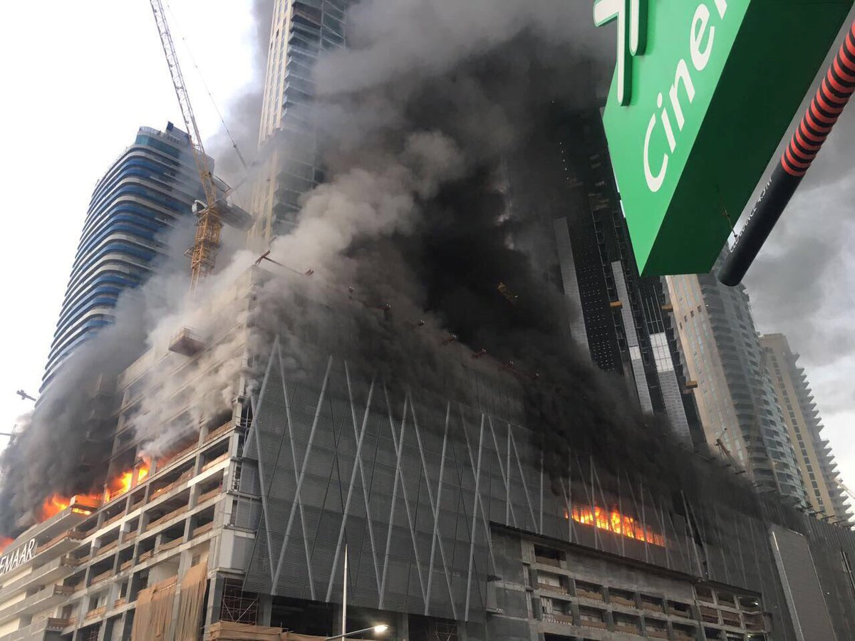 A fire is seen at a tower under construction in Dubai's Downtown district, United Arab Emirates. PHOTO: REUTERS 