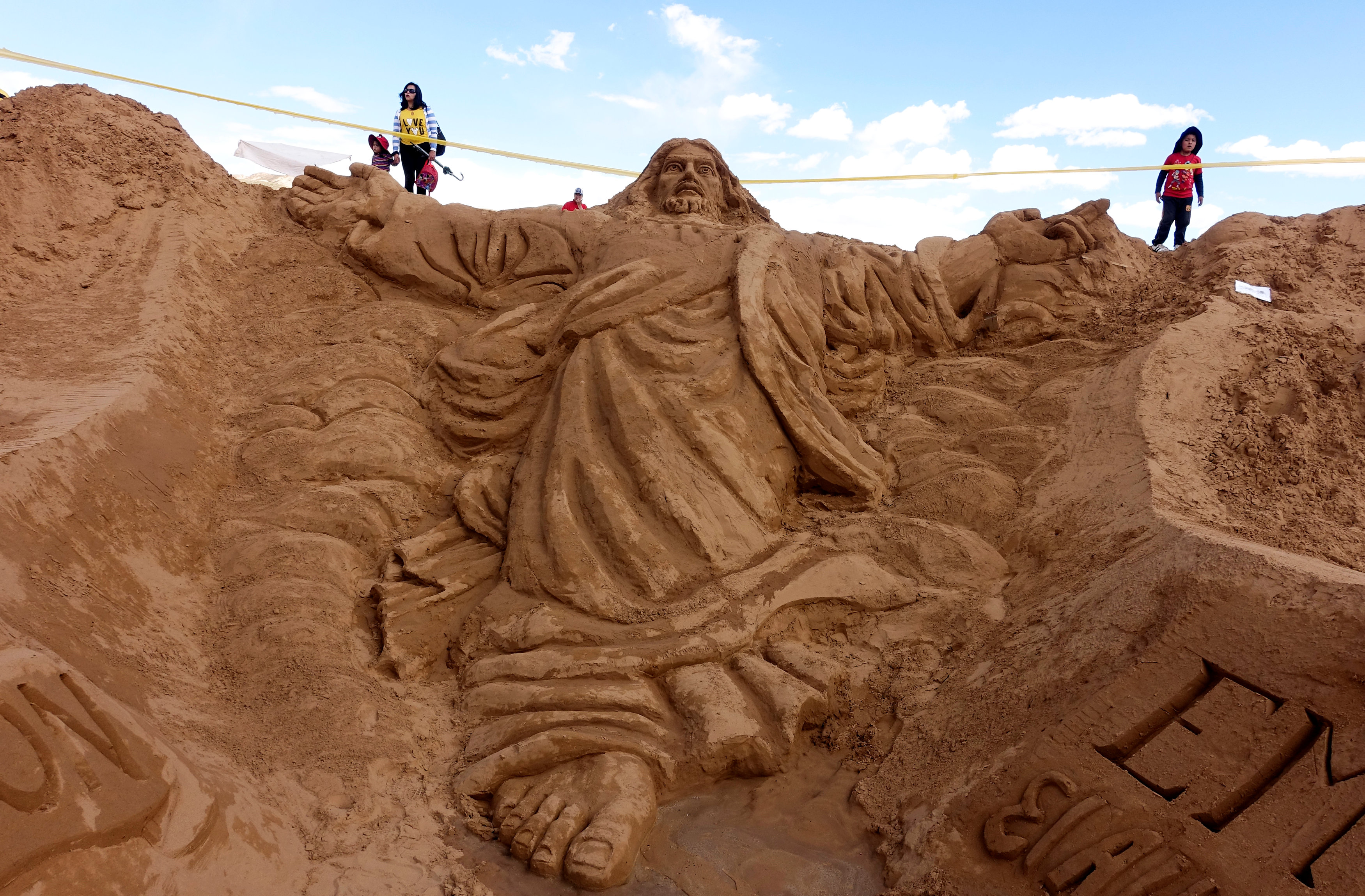 A sand sculpture that depicts Jesus Christ is pictured during Holy Week celebrations in the Arenal de Cochiraya, on the outskirts of Oruro, Bolivia. PHOTO: REUTERS