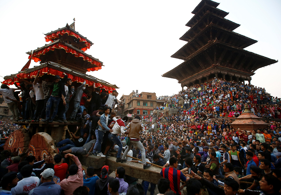 Devotees pull the chariot of God Bhairab during the Biska Festival also known as Bisket festival in Bhaktapur, Nepal. PHOTO: REUTERS