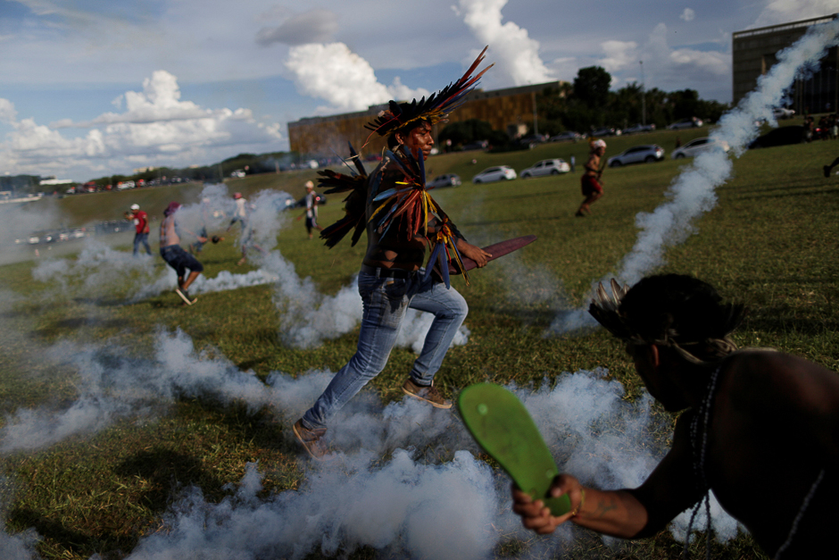 Brazilian Indians take part in a demonstration against the violation of indigenous people's rights, in Brasilia, Brazil. PHOTO: REUTERS