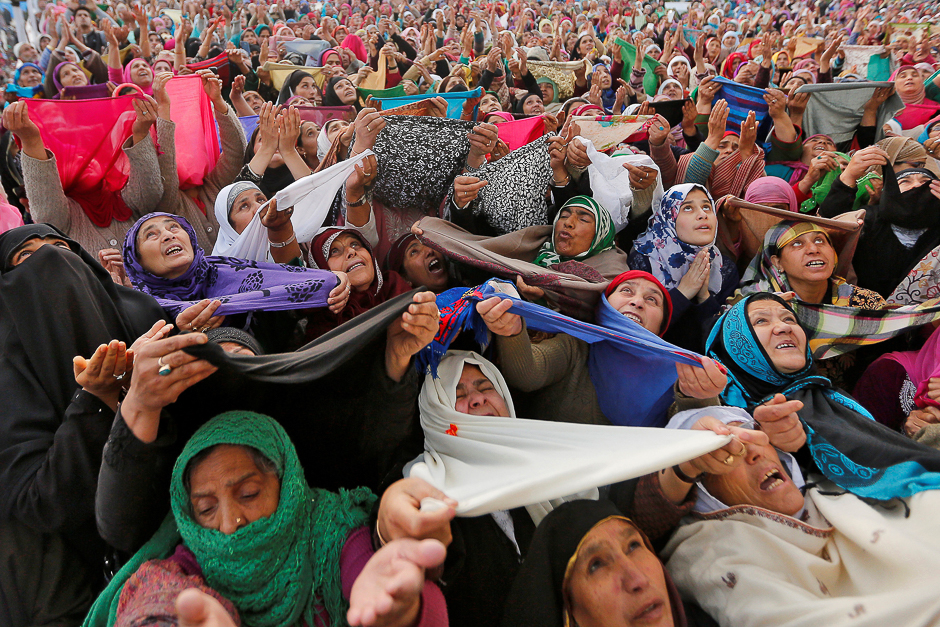 Kashmiri Muslim women pray upon seeing a relic believed to be hair from the beard of Prophet Mohammed during Meeraj-un-Nabi, a festival which marks the ascension of Prophet Mohammed to Heaven, at the Hazratbal shrine in Srinagar. PHOTO: REUTERS