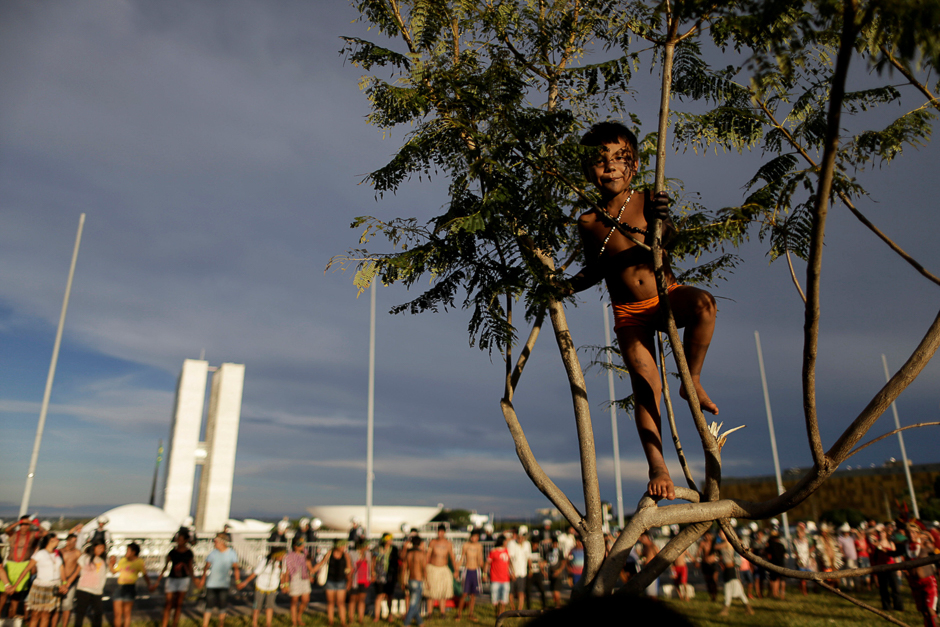 A Brazilian Indian takes part in a demonstration against the violation of indigenous people's rights, in Brasilia, Brazil. PHOTO: REUTERS