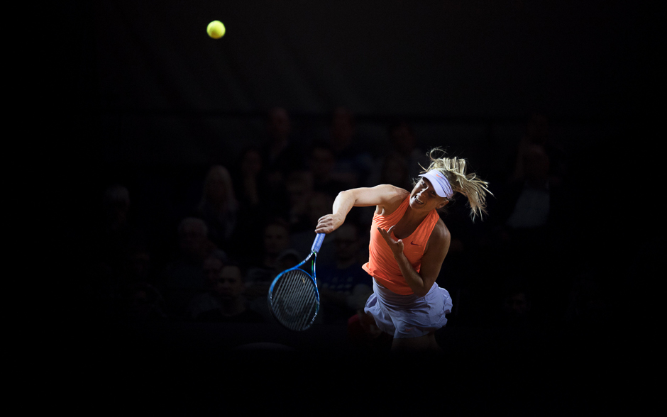 Russia's Maria Sharapova serves to Russia's Ekaterina Makarova in their second round match at the WTA Porsche Tennis Grand Prix in Stuttgart, southwestern Germany. PHOTO: AFP