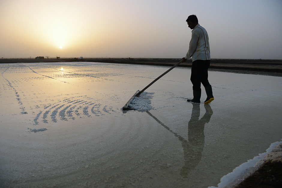 Indian salt pan worker Nirmalbhai Jakhodia working in the Little Rann of Kutch (LRK) region of Gujarat some 180km west of Ahmedabad. PHOTO: AFP