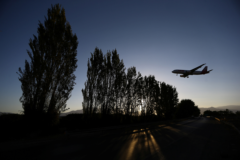 A TAM Airlines plane lands at Santiago International Airport, Chile. PHOTO: REUTERS