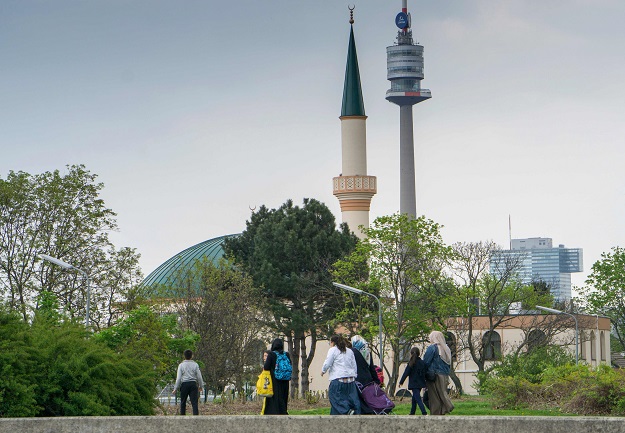Muslim women with children walk towards a mosque at the Islam Centre of Vienna on April 14, 2017 in Vienna, Austria. PHOTO: AFP