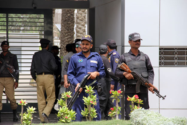 An extra contingent of police and guards were deployed at te office to prevent any untoward occurrence. PHOTO: AYESHA MIR/EXPRESS