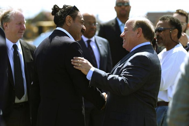 Flex-N-Gate owner and businessman Shahid Khan [L], greets Detroit Mayor Mike Duggan before a groundbreaking ceremony for a Flex-N-Gate manufacturing facility in the I-94 Industrial Park in Detroit, Michigan, US, April 24, 2017. PHOTO: REUTERS