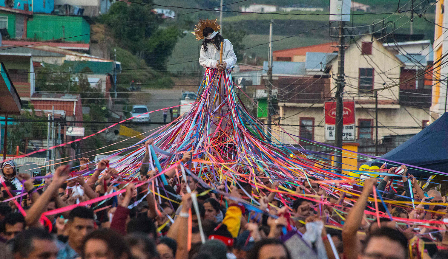 Catholics carry a statue of Jesus Nazareno in a procession known as Jesus Nazareno of the tapes during Holy Week in Cot, Costa Rica, 25 kilometres east of San Jose. According to Jorge Masis, a priest at the church, people tie ribbons to the statue to symbolize promises they make to Jesus during Holy Week. PHOTO: AFP