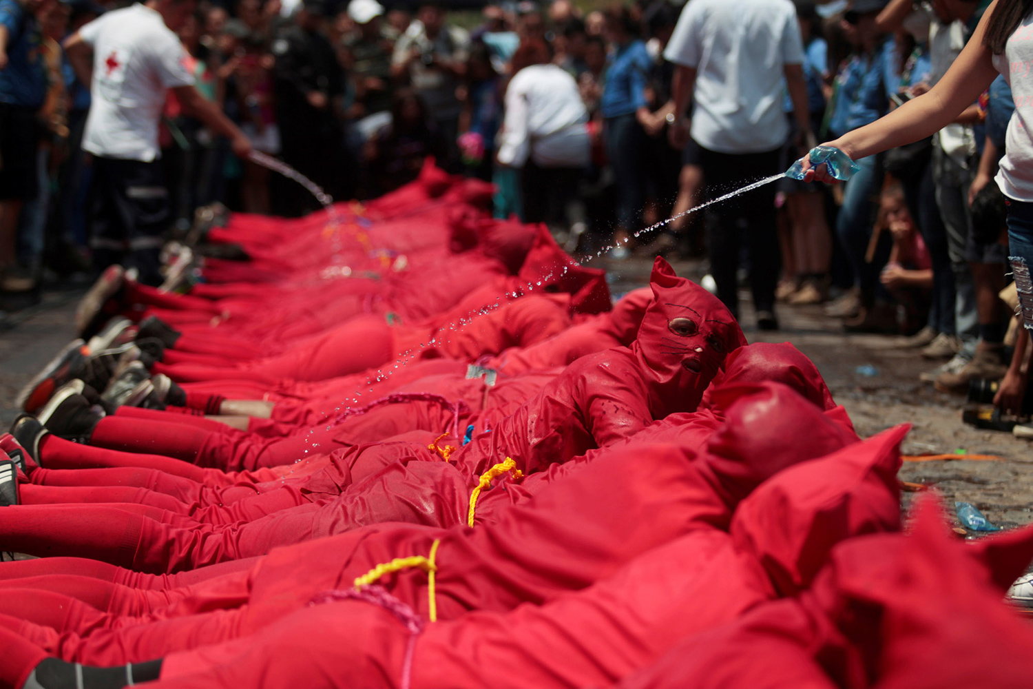 An actor dressed as a demon participates a ceremony known as Los Talciguines, as part of religious activities to mark the start of Holy Week in Texistepeque, El Salvador. PHOTO: REUTERS