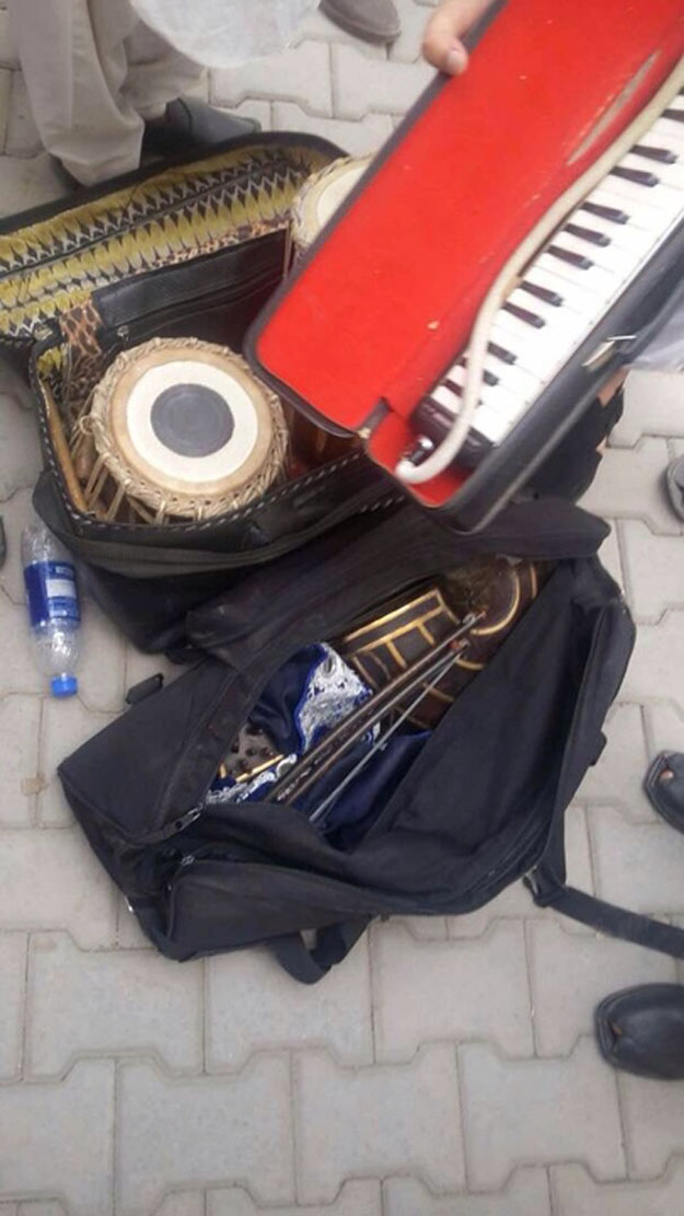 Musical instruments that police confiscated after the event. PHOTO: Izhar ullah/Express 