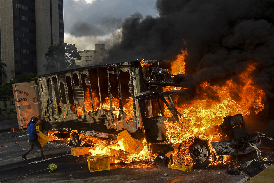 Anti-government protesters block the Francisco Fajardo highway in Caracas during a demonstration against Venezuelan President Nicolas Maduro. PHOTO: AFP
