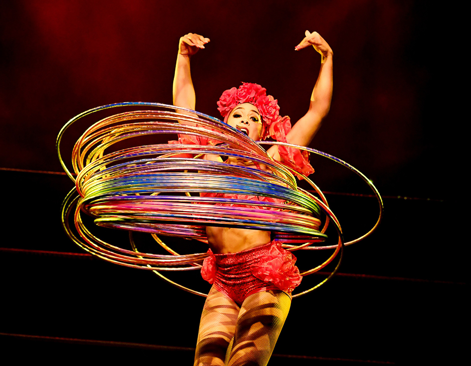 Performer Marawa 'the Amazing', who holds the world record for the most hoola hoops used in a performance (200), dances during a special Cinco de Mayo show by the Lucha Vavoom ensemble in Los Angeles, California. PHOTO: AFP