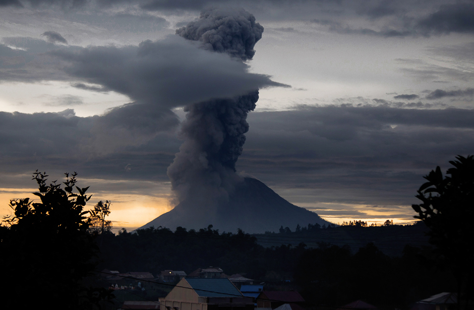Mount Sinabung volcano spews thick volcanic ash, as seen from Brastagi, in Karo, North Sumatra province. Sinabung roared back to life in 2010 for the first time in 400 years. PHOTO: AFP