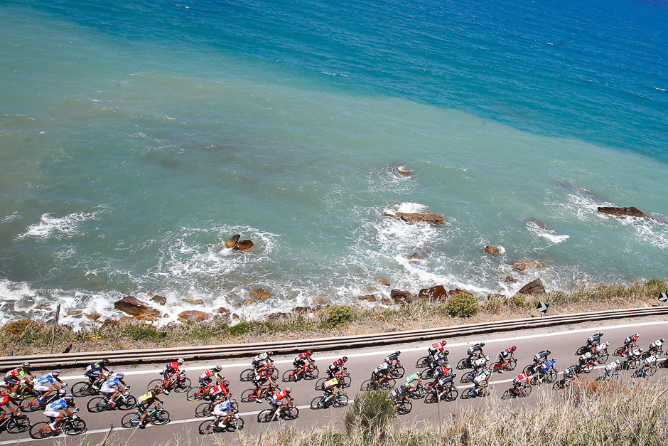 The peloton rides along the sea during the 4th stage of the 100th Giro d'Italia, Tour of Italy, cycling race from Cefalu to Etna volcano. PHOTO: AFP