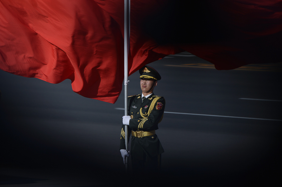 Chinese honour guards prepare for the arrival of Vietnamese President Tran Dai Quang and Chinese President Xi Jinping during a welcome ceremony at the Great Hall of the People in Beijing. PHOTO: AFP