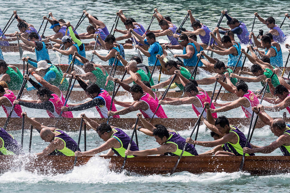 Competitors take part in a dragon boat race in Hong Kong. The races are part of a multi-million dollar programme of events organised to celebrate Hong Kong's 20th handover anniversary from Britain to China which falls on July 1. PHOTO: AFP
