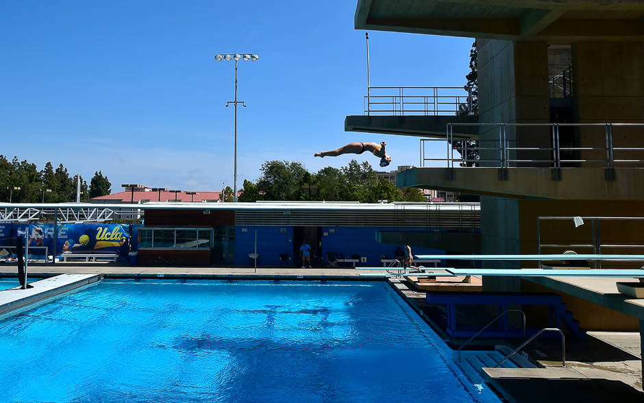 A diver practices her routine as journalists tour the University of California Los Angeles (UCLA) campus which will host the Athelete's village and provide training facilities for a number of sports, including two which are due to be held on the campus as the IOC Evaluation Commission continues with its visit to Los Angeles, California, before a vist to Paris and the September vote for the 2024 Summer Olmympics. PHOTO: REUTERS