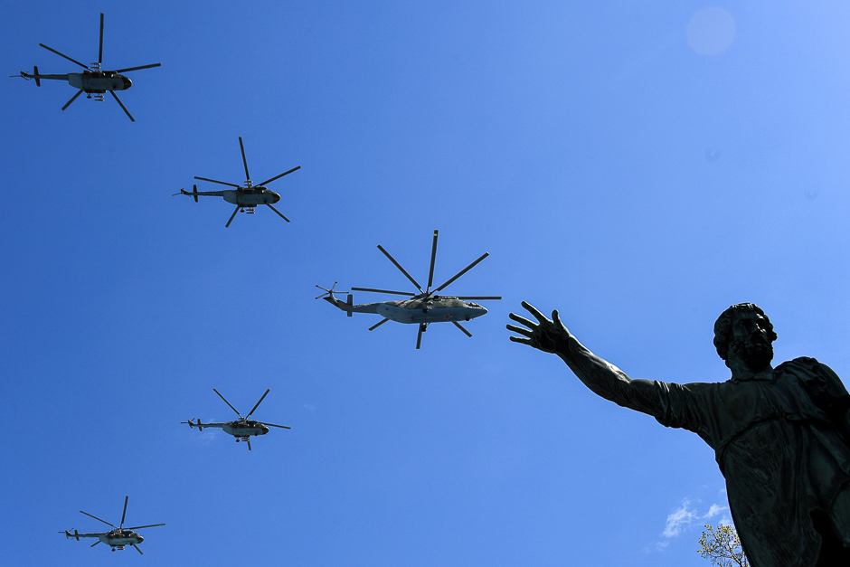 Russian Mi-8 and Mi-26 helicopters fly over Red Square during a rehearsal for the Victory Day military parade in Moscow. PHOTO: AFP