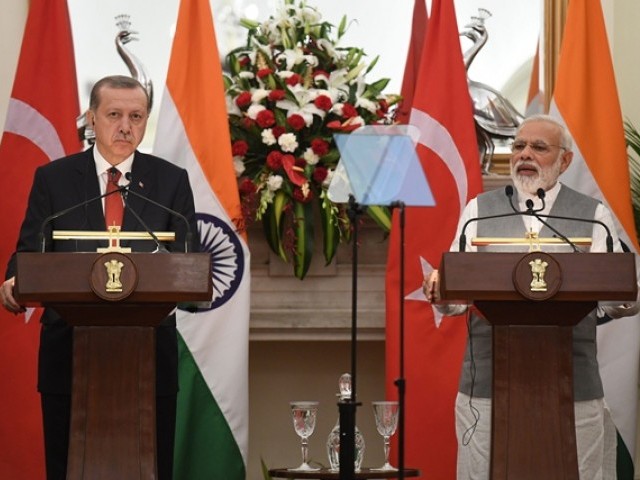 Indian Prime Minister Narendra Modi and Turkish President Recep Tayyip Erdogan take part in a joint press conference during an exchange of agreements in New Delhi. PHOTO: AFP 