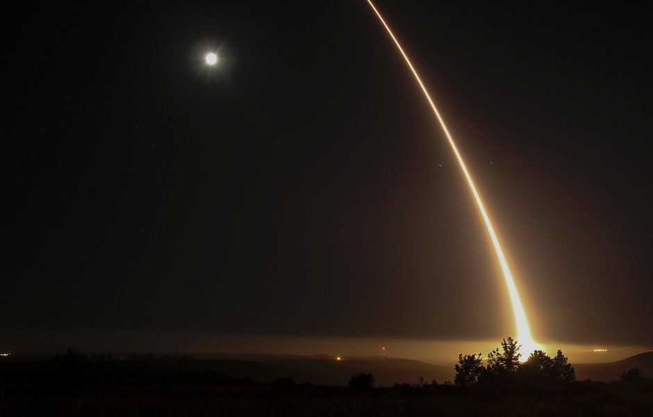 A streak of light trails off into the night sky as the US military test fires an unarmed intercontinental ballistic missile (ICBM) at Vandenberg Air Force Base, some 130 miles (209 kms) northwest of Los Angeles, California. PHOTO: AFP