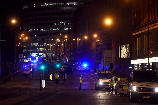 Police deploy at scene of explosion in Manchester, England, on May 23, 2017 at a concert. British police said early May 23 there were 